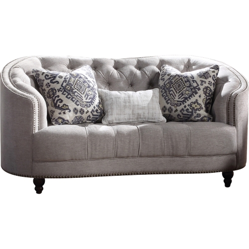 Saira Curved Loveseat in Light Gray Fabric with Nailhead