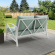 Kaplan Outdoor Loveseat in White Steel & Mist Cushions