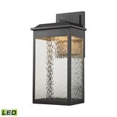 Newcastle LED Outdoor Wall Sconce in Matte Black & Water Glass