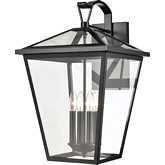 Main Street 23"H 4 Light Outdoor Wall Sconce in Black & Clear Glass