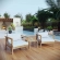 Bayport 3 Piece Outdoor Arm Chair Set in Teak & White Fabric
