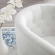 Prospect Swivel Arm Chair in Tufted White Fabric