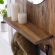 Glint Round Mirror in Walnut Finish