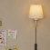 Sunlit Swivel Wall Sconce in Natural Finish Wood, White Metal & Fabric