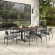 Aeris 9 Piece Outdoor Dining Set in Black Aluminum, Faux Wood & Gray Fabric