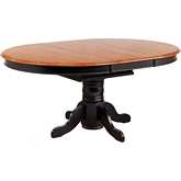 Selections 48" Round to 66" Oval Pedestal Dining Table in Antique Black & Cherry